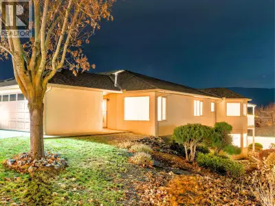 An executive designer home in Vernon’s sought-after Inglewood community, composed with the grace of...