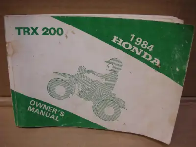 1984 Honda TRX 200 owners manual in good condition and complete it contains both English and French...