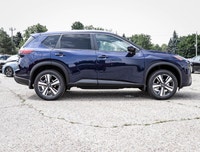 The 2025 Nissan Rogue SV Moonroof in a stunning blue finish equipped with AWD is perfect for those s... (image 4)