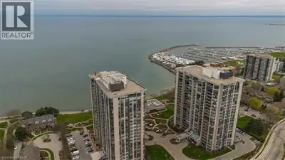 Wake up to breathtaking, unobstructed views of Lake Ontario from this sun-drenched corner residence,...