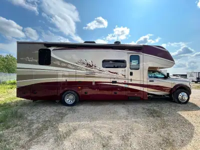 Dynamax Isata 5 Super C diesel motorhome 30FW highlights: Semi-Private Bedroom Three LED TVs Bunk Ov...