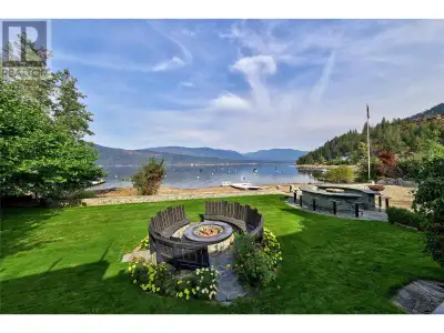 Discover the ultimate in lakeside living at this luxurious waterfront retreat, nestled along the sho...