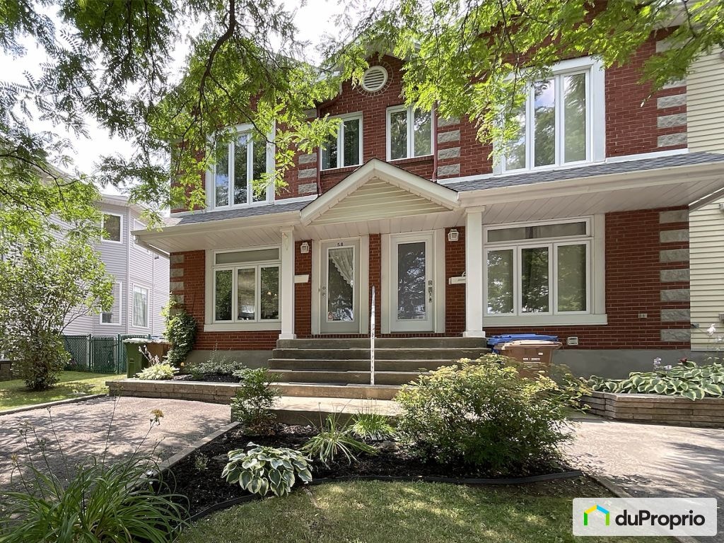 $565,000 - Townhouse for sale in Candiac — photo 1