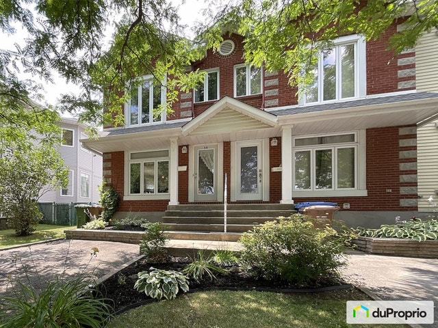 $565,000 - Townhouse for sale in Candiac — photo 1