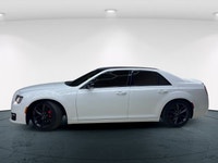 The 2023 Chrysler 300, particularly the 300C RWD in pristine white, is a powerful sedan that truly s... (image 8)