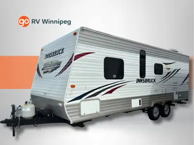 Highlights: Rear Bunkhouse Layout Private Front Bedroom Large Slide-Out Living Area Full Kitchen wit...