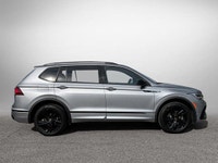 This Volkswagen Tiguan delivers a Intercooled Turbo Regular Unleaded I-4 2.0 L/121 engine powering t... (image 3)