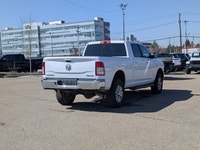 This pre-owned 2022 Ram 2500 Big Horn Crew Cab offers a clean and commanding look with its Bright Wh... (image 6)
