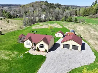 Discover tranquility in this 2011-built home just minutes from charming Wakefield. Boasting maple ha...