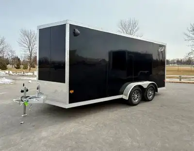 Triton Nxt 7x16 cargo trailer. This trailer has torsion axles, aluminum wheels, and a ramp door.Blac...