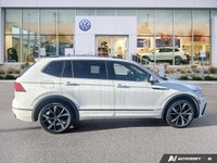 This Volkswagen Tiguan delivers a Intercooled Turbo Regular Unleaded I-4 2.0 L/121 engine powering t... (image 5)