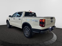 Check out this vehicle's pictures, features, options and specs, and let us know if you have any ques... (image 2)