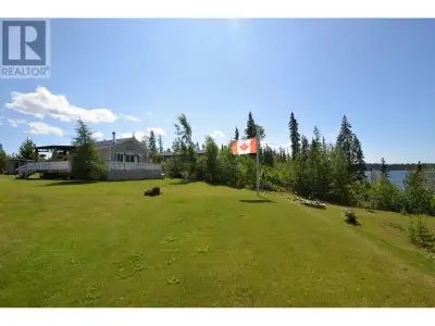 This stunning fully landscaped and serviced lake property has a gentle lake approach with less then...
