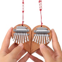 2 Half-Heart Kalimbas with hard case-Finger and portable piano City of Montréal Greater Montréal Preview
