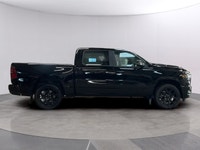 Experience the power and style of the 2026 Ram 1500 Sport, a striking black 4x4 truck designed to ha... (image 5)