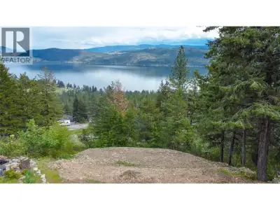 ""Nestled within the tranquil enclave of Westshore Estates, this .37-acre Okanagan lake view lot off...