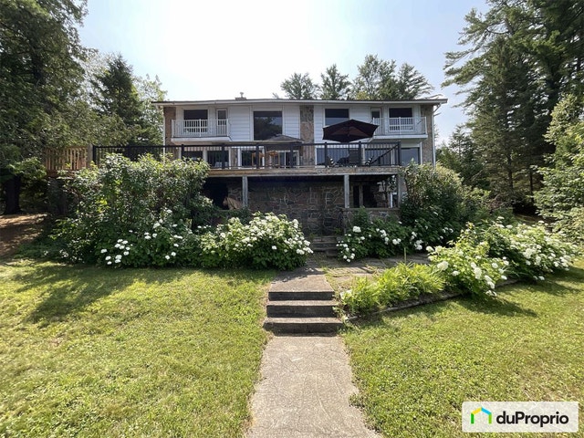 $850,000 - Cottage for sale in St-Alphonse-Rodriguez — photo 1