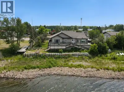 A cottage in Joussard, Alberta, inviting you to enjoy a year-round lakefront lifestyle. This 2009-bu...