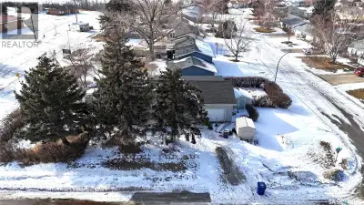 4-Bedroom Bungalow for SALE IN OUTLOOK, Saskatchewan with ATTACHED GARAGE AND RV PARKING Welcome to...