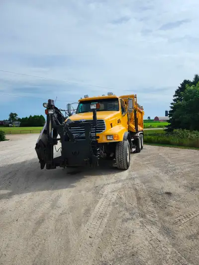 2007 STERLING TANDEM AXLE DUMP TRUCK WITH SNOWPLOW AND SANDER. MERCEDES MB4000 ENGINE, 8LL EATON MAN...