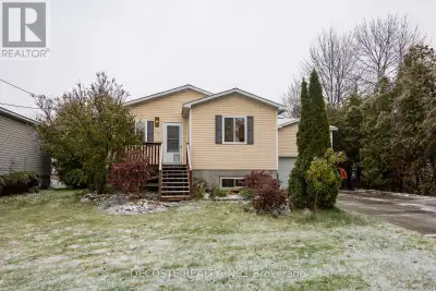 Welcome to this well-maintained raised bungalow, a fantastic family home built in 2009. This move-in...
