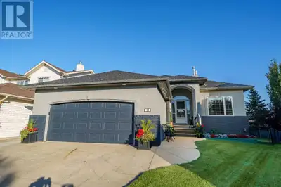 Stunningly renovated walkout bungalow with over 3,800 sq. ft. of developed space on a huge pie lot b...