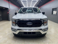 Experience the power and versatility of the 2022 Ford F-150 XLT 4WD SuperCrew, a white powerhouse bu... (image 5)