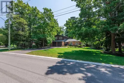 Nestled on a sprawling 1/3 of an acre, framed by large mature trees and stunning perennial gardens,...