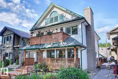 Wonderful 2350 sq ft 2.5 story custom built 2 plus 2 bedroom home on a quiet tree lined street just...