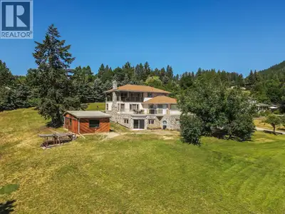 Set on a private 1.2-acre parcel in the heart of Erickson, this distinctive 3-bedroom, 4-bathroom ho...