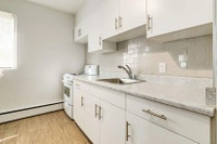 Amenities: Walk-In Closets • Heat & Water Included • Affordable Parking Suite & Building: One-bedroo... (image 4)