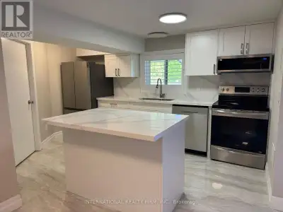 Spacious, Newly Renovated Walk-Out Basement in Aurora Heights with Private Backyard! This entirely r...