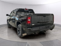 Step into the future with the striking 2026 Ram 1500 Sport 4x4 Crew Cab 57 Box finished in a bold bl... (image 2)