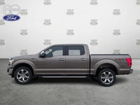 This one owner, accident free trade includes: - Power Heated Front Seats - Heated Second Row - Heate... (image 2)