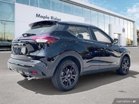 This 2022 Nissan Kicks SV, boasting a sleek Super Black exterior and a stylish charcoal interior, is... (image 4)