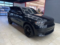 Experience the bold presence and versatility of the 2019 Dodge Durango GT in striking black with an... (image 1)