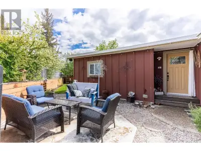 This bright and airy 2 bedroom home has been beautifully updated and sits on its own land on a desir...