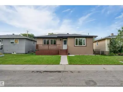 LOCATION, VALUE & VERSATILITY! Ideally situated just steps from the LRT, this charming raised bungal...