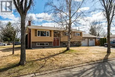 Step into comfort and classic style with this well-maintained, 4-bedroom split-entry home, perfectly...