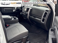 Presenting the stunning 2023 Ram 1500 Classic SLT 4x4 Crew Cab in an elegant White finish, paired wi... (image 7)