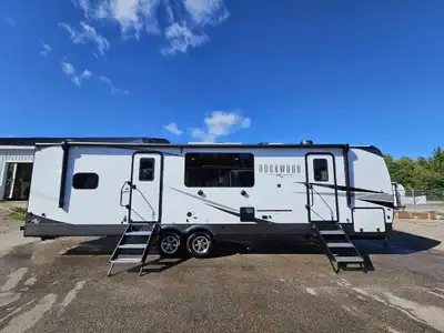 Brand new model for 2025. Double bunks in the rear with 2 piece bath and small desk area. Queen bed...