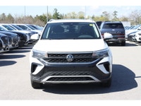 Experience modern design, efficient performance, and everyday versatility in this 2024 Volkswagen Ta... (image 1)