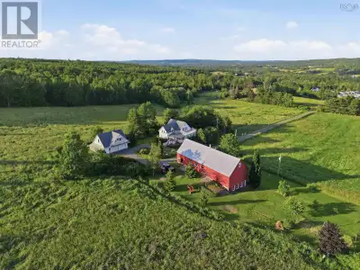 This 162-acre estate, situated on two PIDs, offers a mix of residential comfort and functional land...