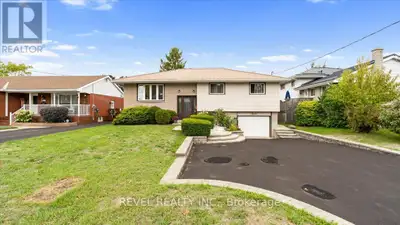 Welcome to this charming 3 + 1 bedroom, 2 bathroom raised bungalow ideally situated in a quiet, conv...