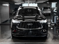 The 2024 INFINITI QX60 LUXE serves as the tech-forward sweet spot of the lineup, balancing premium u... (image 3)