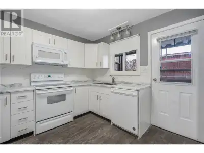 Welcome to this beautifully updated townhouse with NO Age Restriction and allows pets upon approval....