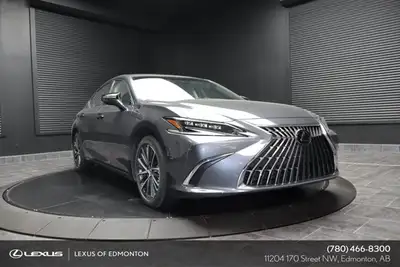 Discover the future of luxury driving in our 2025 Lexus ES 300H LUXURY, adorned in a sophisticated C...