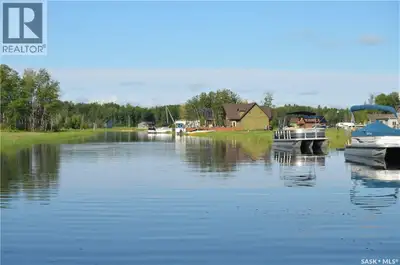 Build your getaway in the heart of lake country with this waterfront lot along the channel at South...