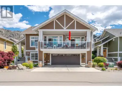 Experience the joys of lakeside living at the Cottages on Osoyoos Lake with this pristine MALBEC hil...