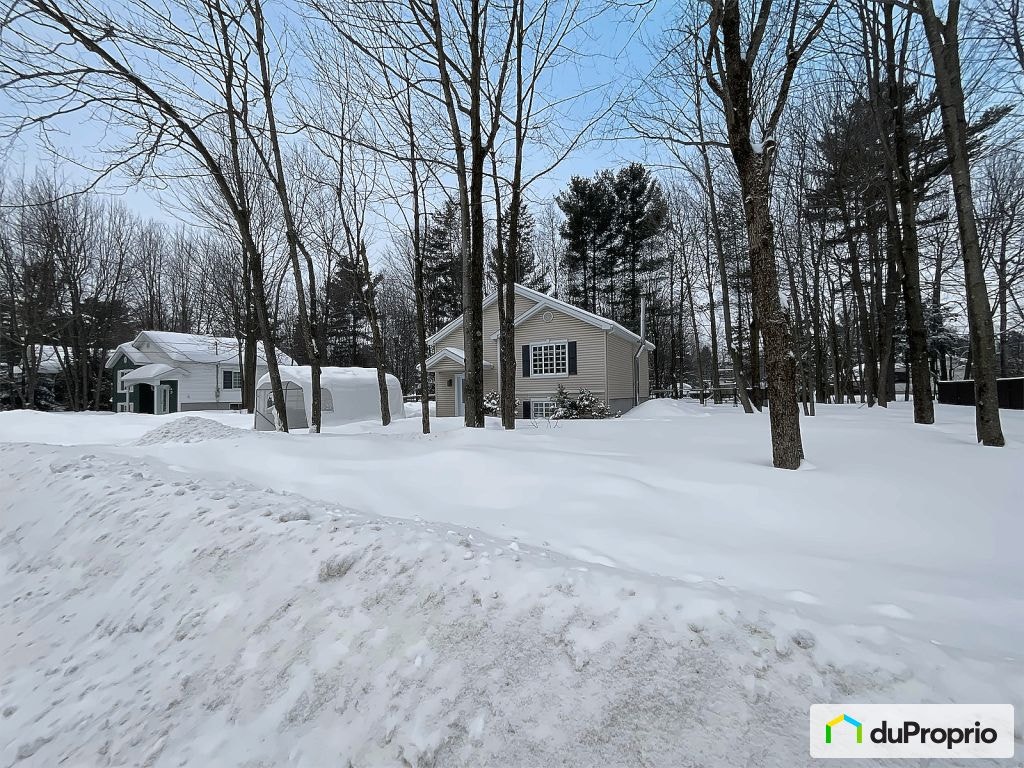 $489,900 - Bungalow for sale in St-Lin-Laurentides — photo 1